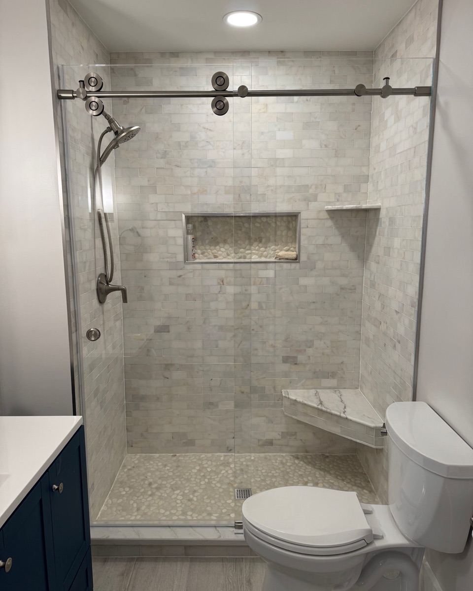 Driftwood Series dual sliding shower doors on a walk-in shower in Maryland