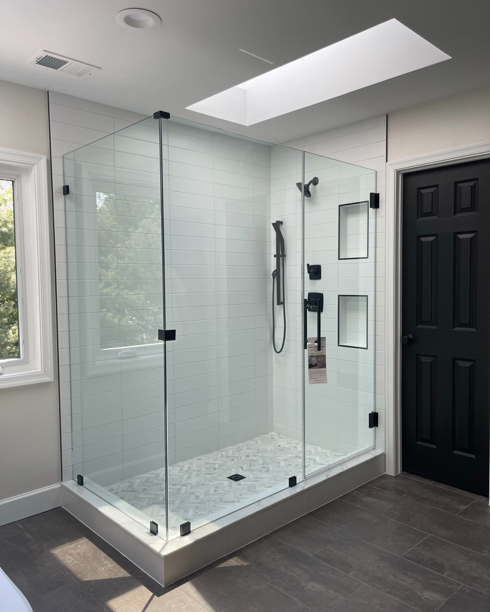 90-degree frameless corner shower enclosure with low-iron glass and matte black hardware in Maryland